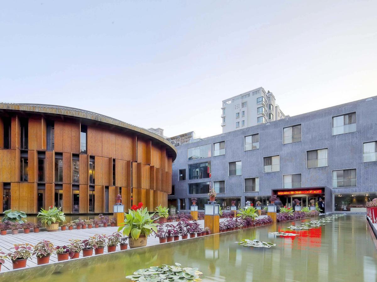 צ'ינגדאו China Community Art Habitat Hotel מראה חיצוני תמונה