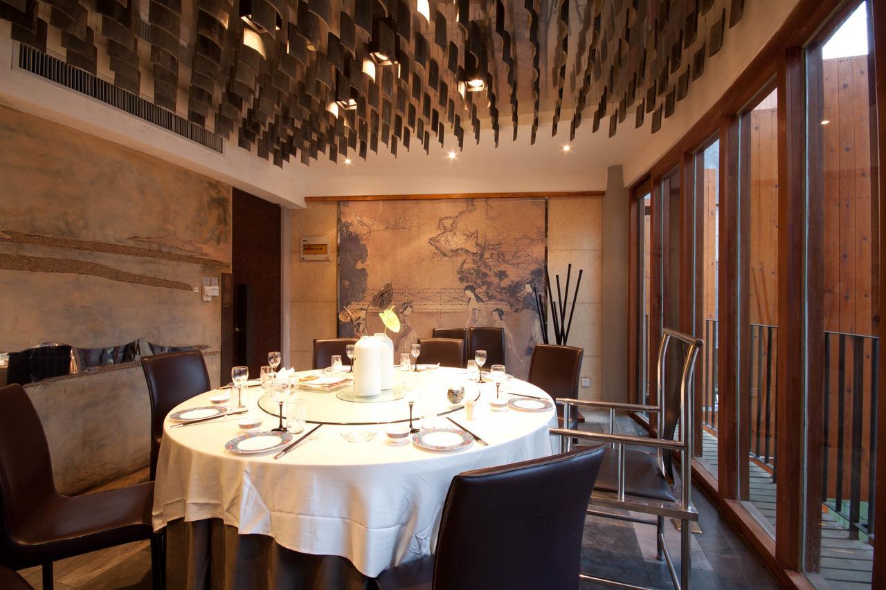 צ'ינגדאו China Community Art Habitat Hotel מראה חיצוני תמונה