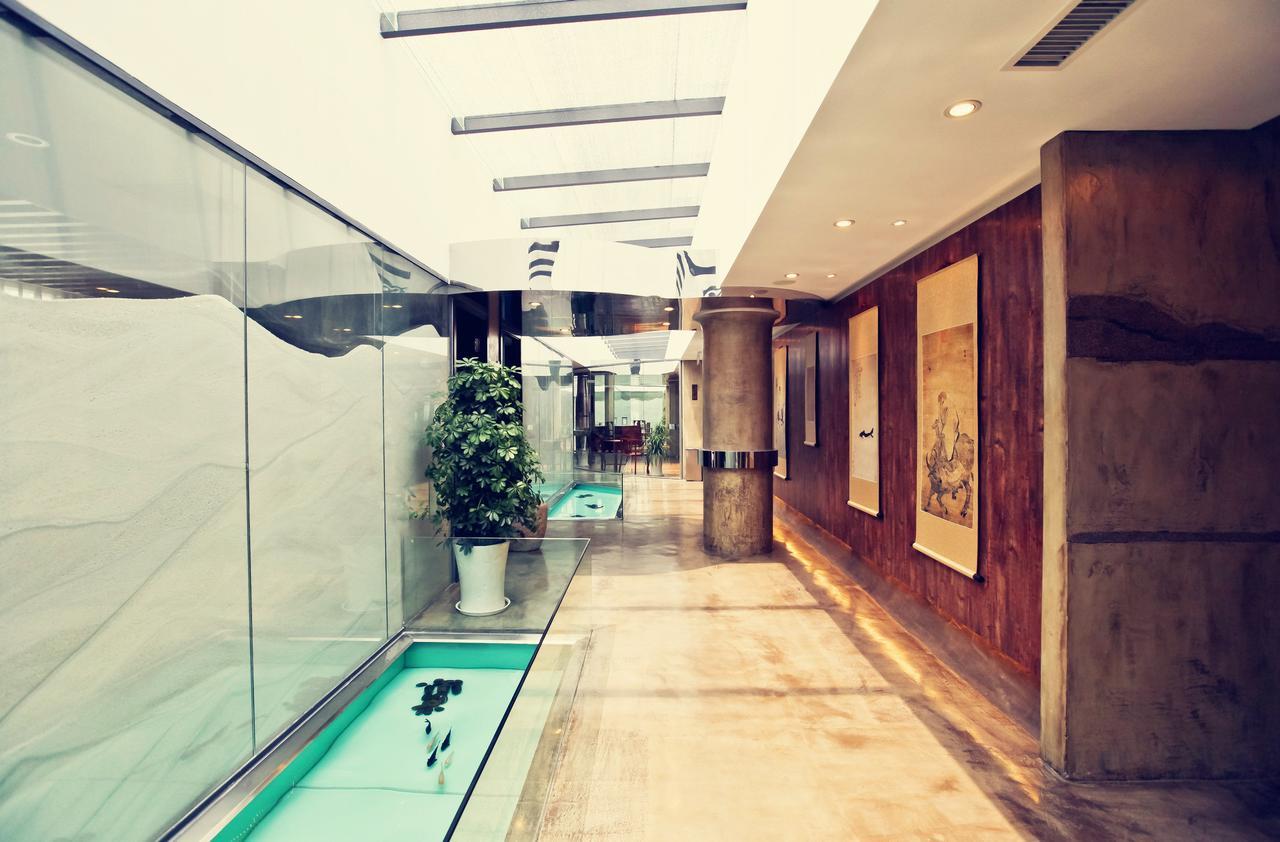 צ'ינגדאו China Community Art Habitat Hotel מראה חיצוני תמונה