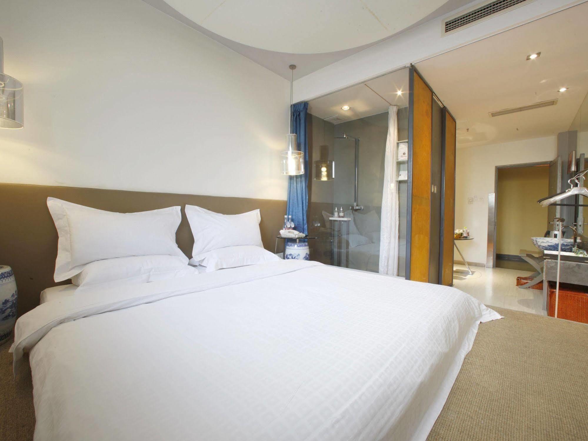 צ'ינגדאו China Community Art Habitat Hotel מראה חיצוני תמונה