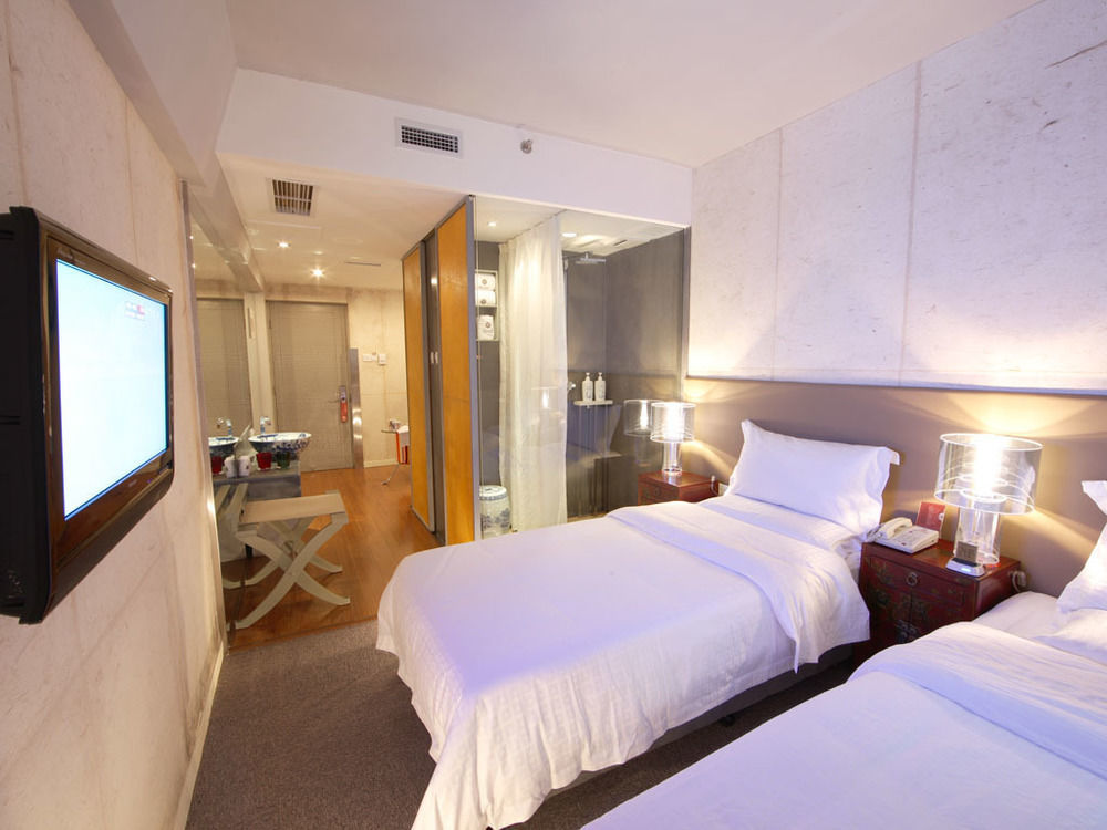 צ'ינגדאו China Community Art Habitat Hotel מראה חיצוני תמונה