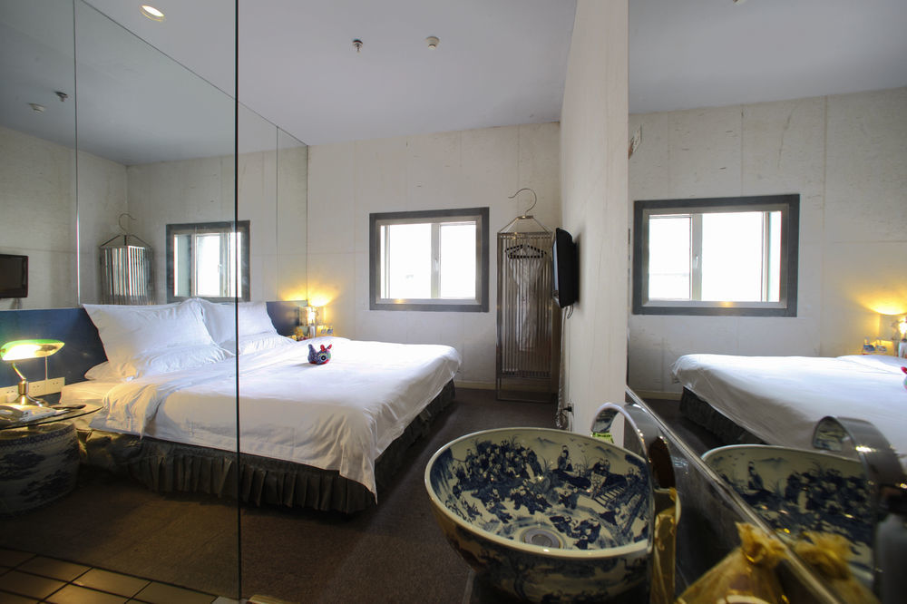 צ'ינגדאו China Community Art Habitat Hotel מראה חיצוני תמונה